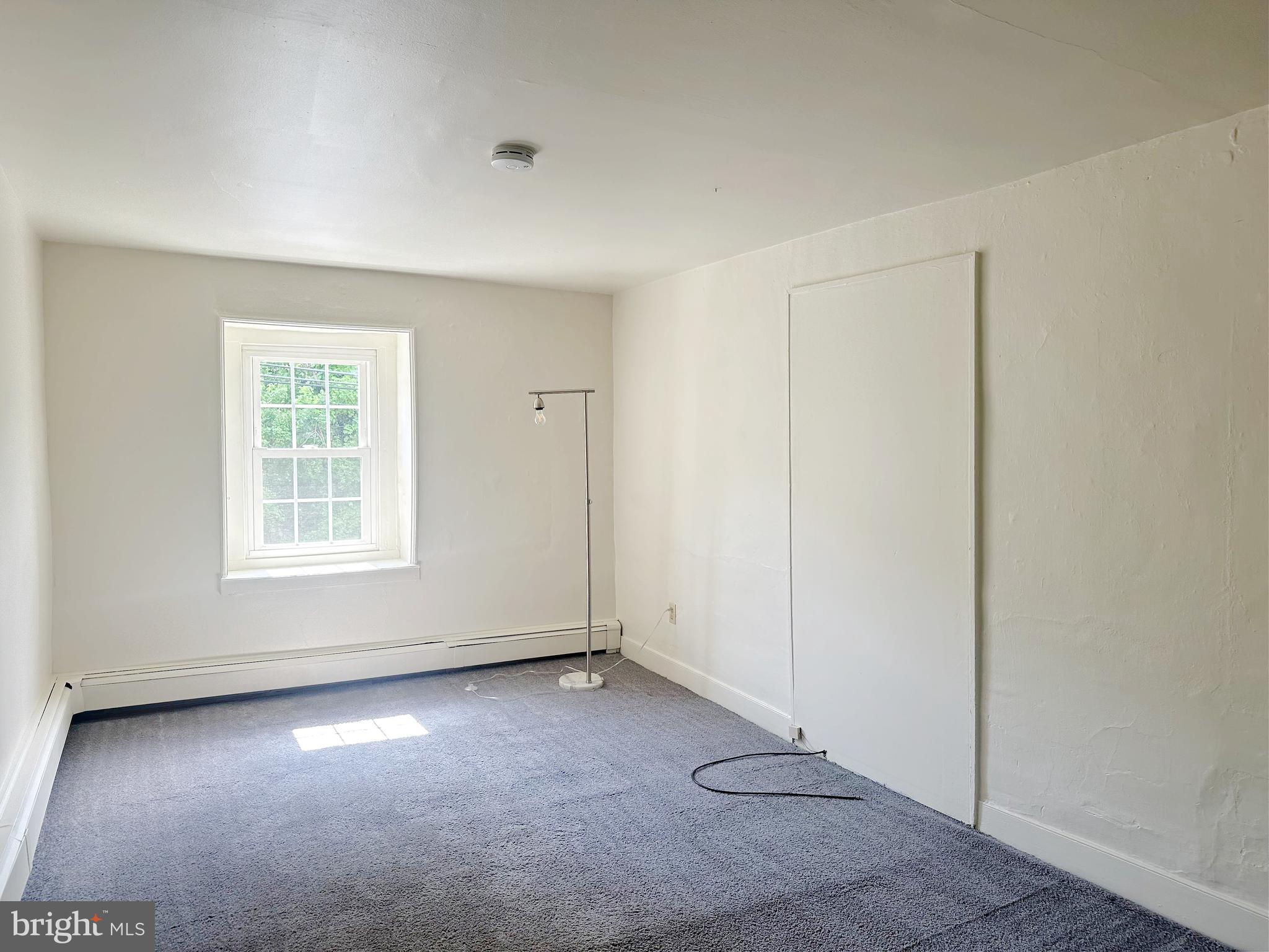 3198 Main Street Green Lane, PA 18054 - Photo 16 of 18 an empty room with windows