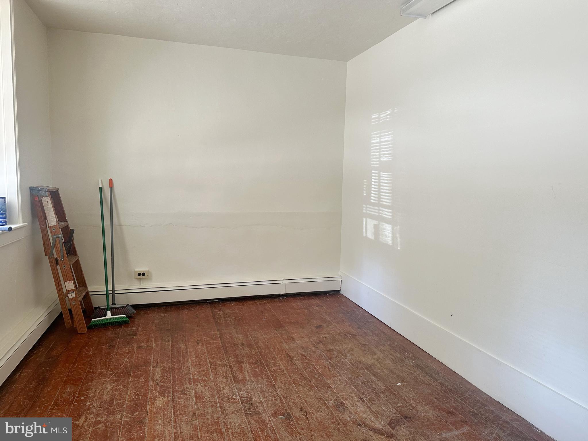 3198 Main Street Green Lane, PA 18054 - Photo 4 of 18 an empty room with a door