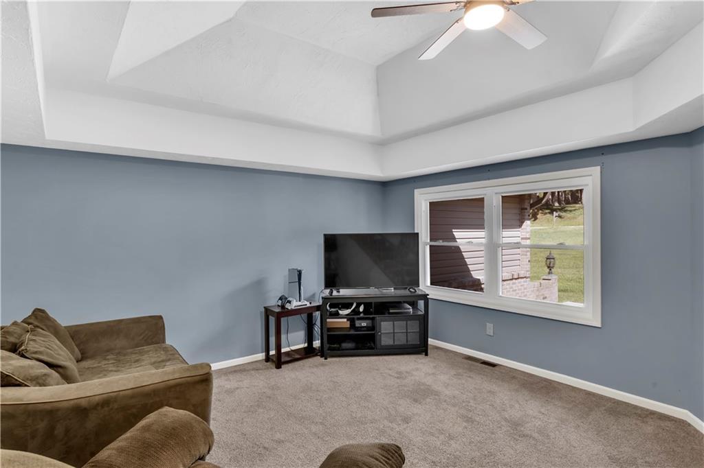 2171 Robbins Station Road Irwin, PA 15642 - Photo 23 of 50 Gorgeous large tray ceiling in this large living room space.
