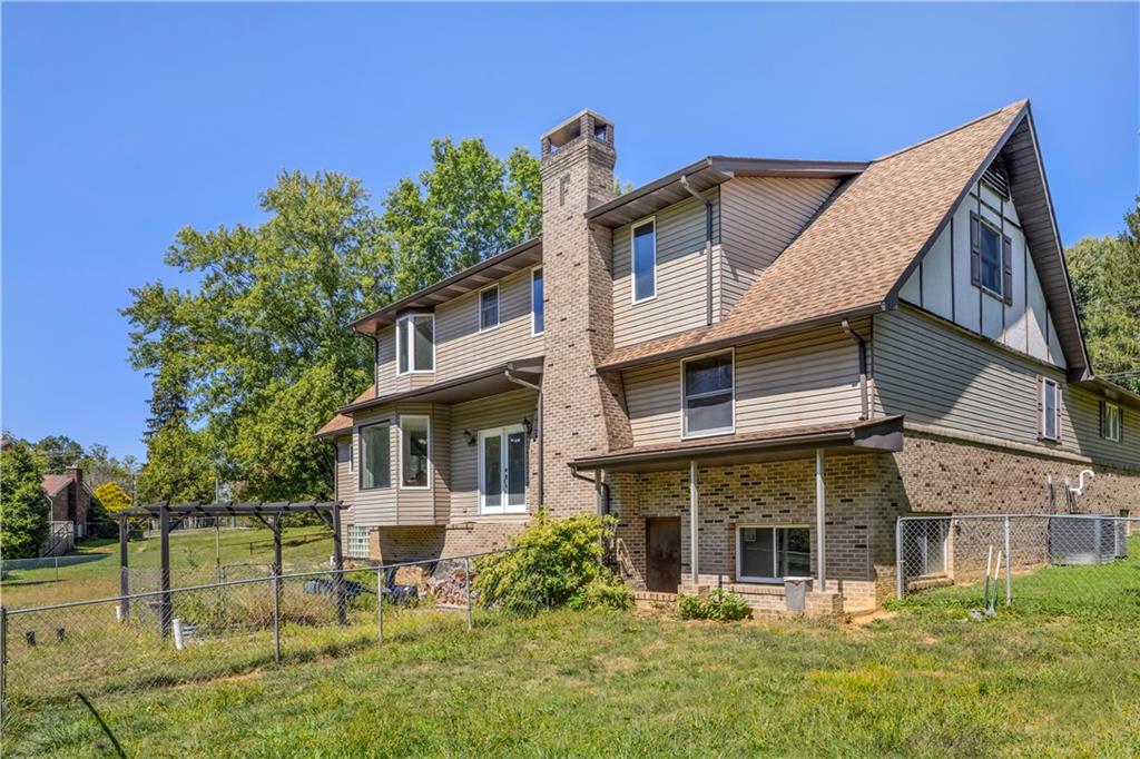 2171 Robbins Station Road Irwin, PA 15642 - Photo 42 of 50 Includes a walk out basement & fenced in dog yard for animal lovers.