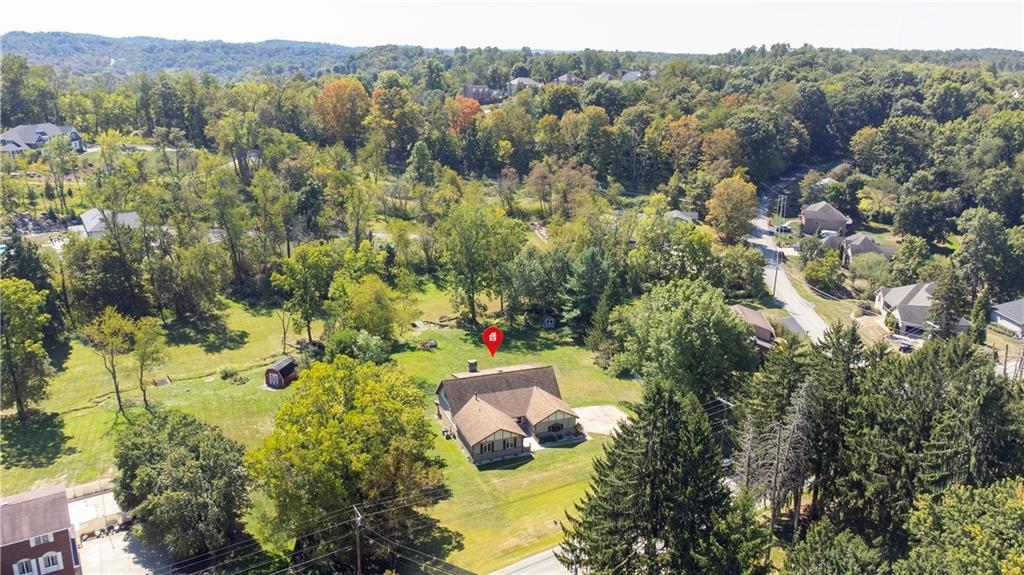 2171 Robbins Station Road Irwin, PA 15642 - Photo 43 of 50 This listing features a scenic landscape with lush greenery and peaceful surroundings.