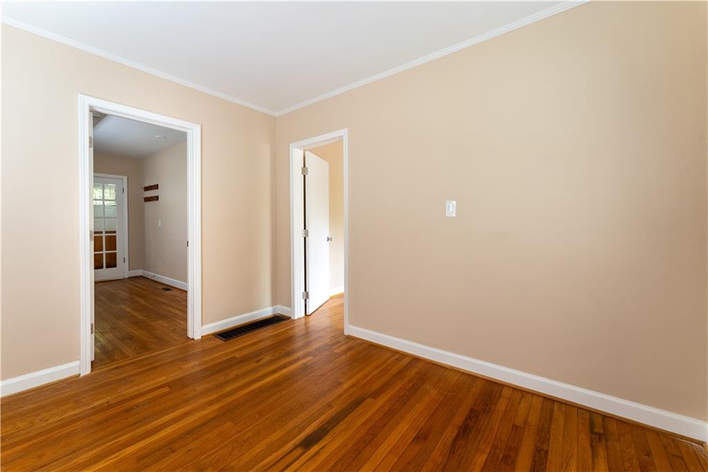 1387 Church Street Decatur, GA 30030 - Photo 12 of 37 a view of an empty room with wooden floor