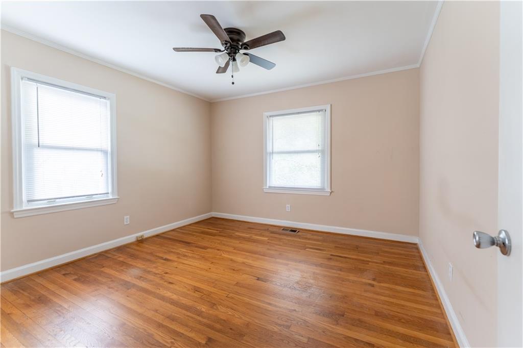 1387 Church Street Decatur, GA 30030 - Photo 23 of 37 wooden floor in an empty room with a window