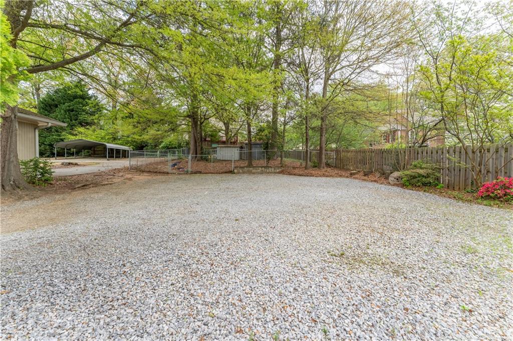 1387 Church Street Decatur, GA 30030 - Photo 30 of 37 a view of a dirt road and trees