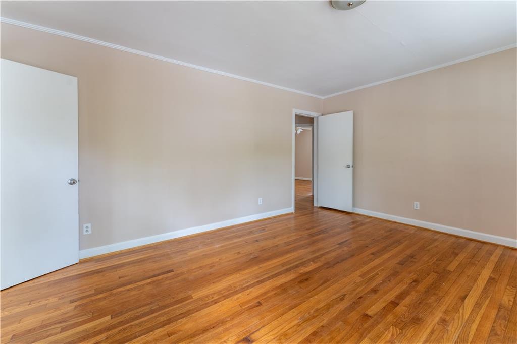 1387 Church Street Decatur, GA 30030 - Photo 7 of 37 a view of an empty room with wooden floor