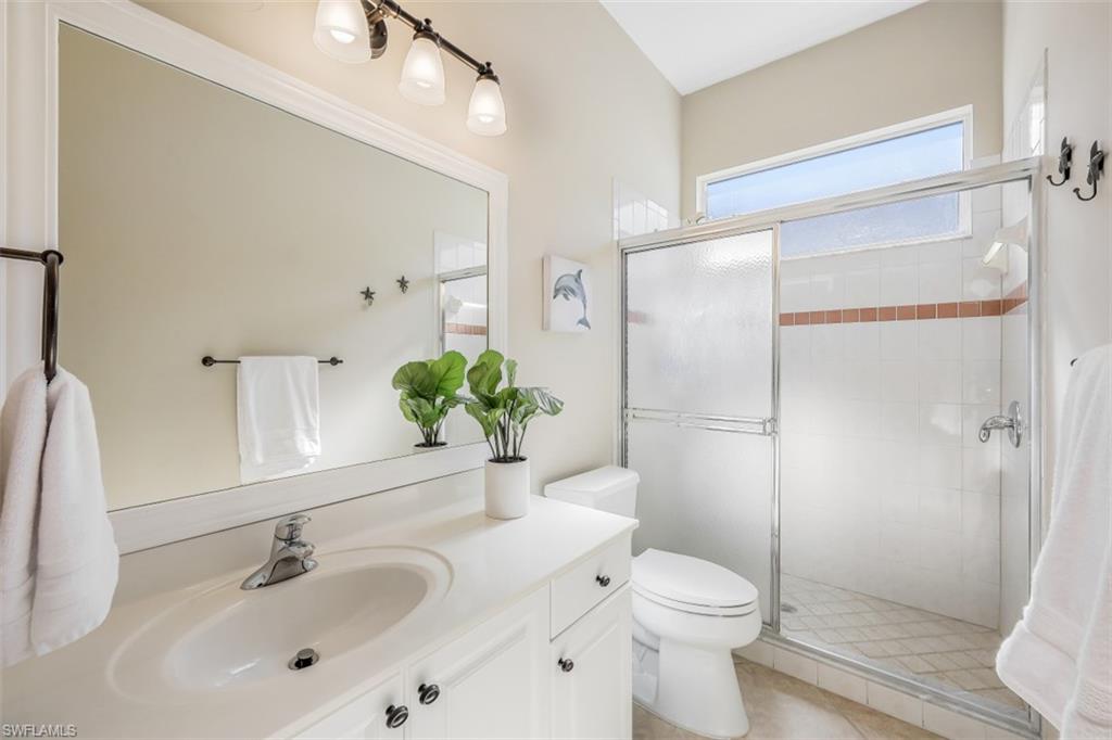 21641 Helmsdale Run Estero, FL 33928 - Photo 17 of 35 a bathroom with a sink toilet and shower