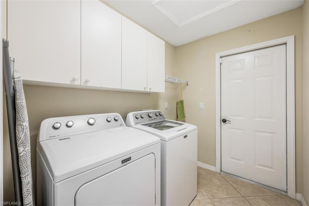 21641 Helmsdale Run Estero, FL 33928 - Photo 20 of 35 a view of storage and utility room with washer and dryer