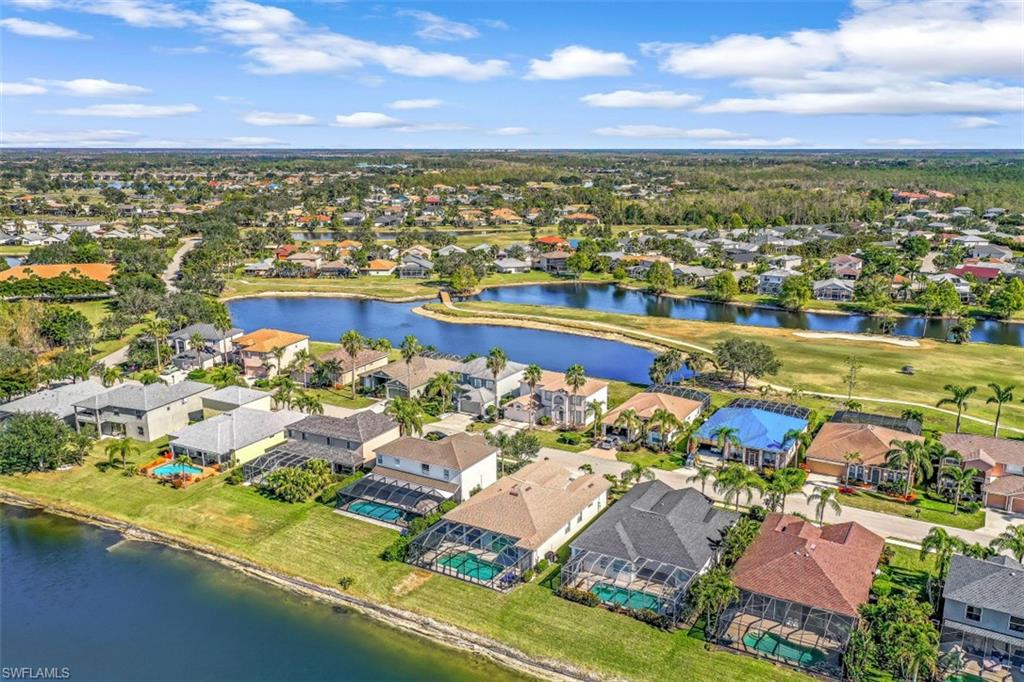 21641 Helmsdale Run Estero, FL 33928 - Photo 28 of 35 an aerial view of residential houses with outdoor space