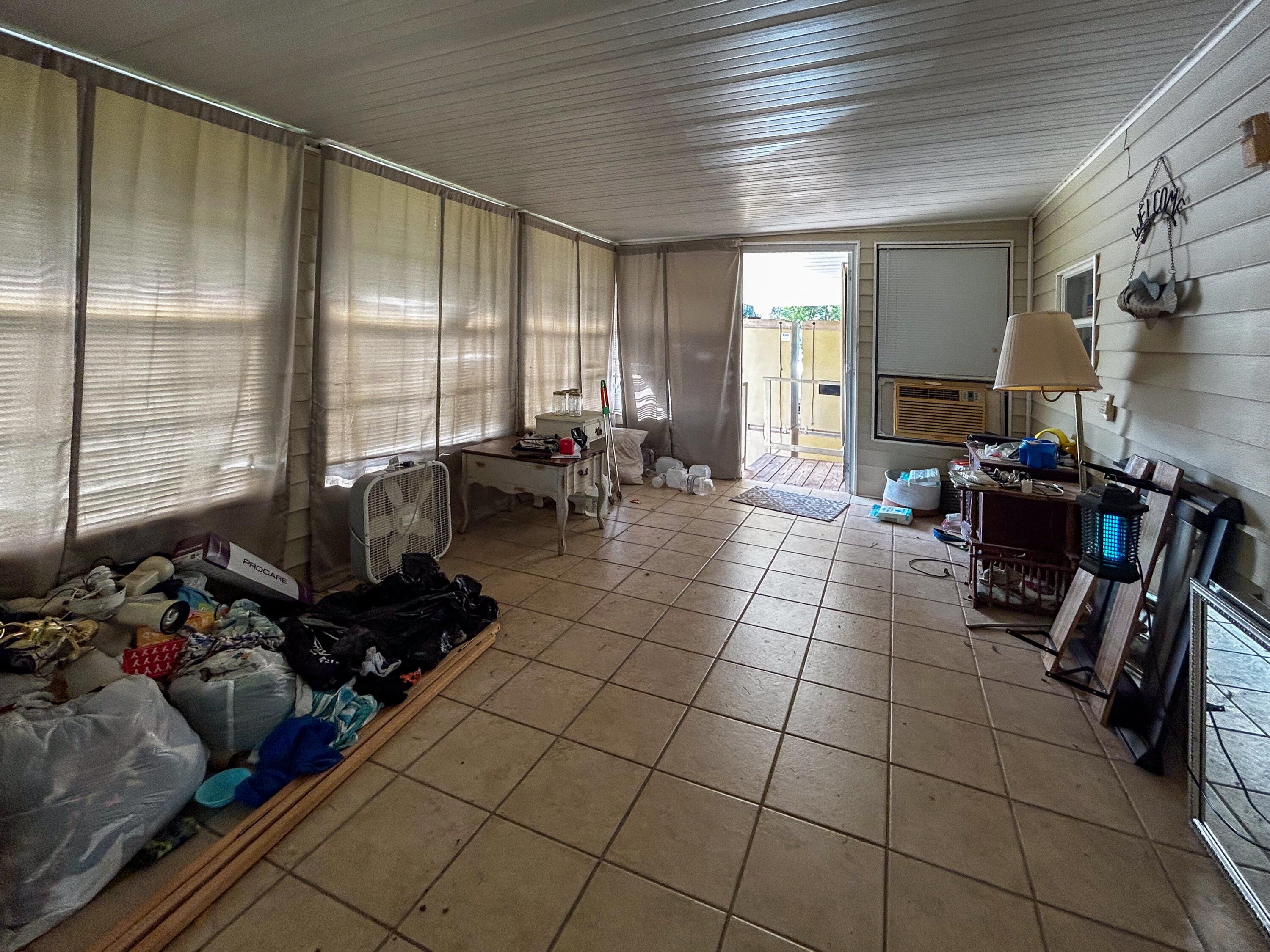 2446 Southeast Carroll Street Stuart, FL 34997 - Photo 11 of 37 a living room with furniture