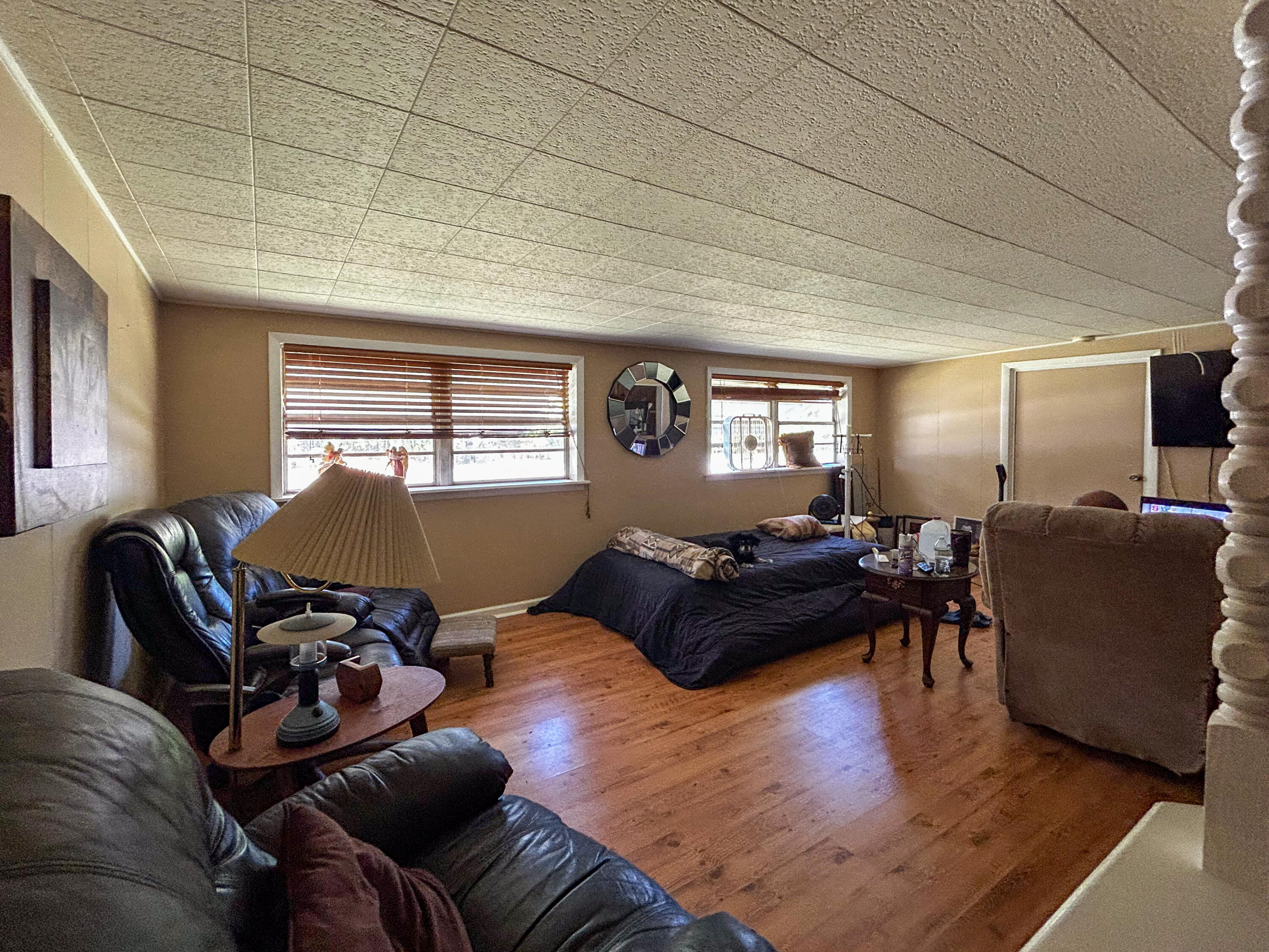 2446 Southeast Carroll Street Stuart, FL 34997 - Photo 14 of 37 a living room with furniture and a window