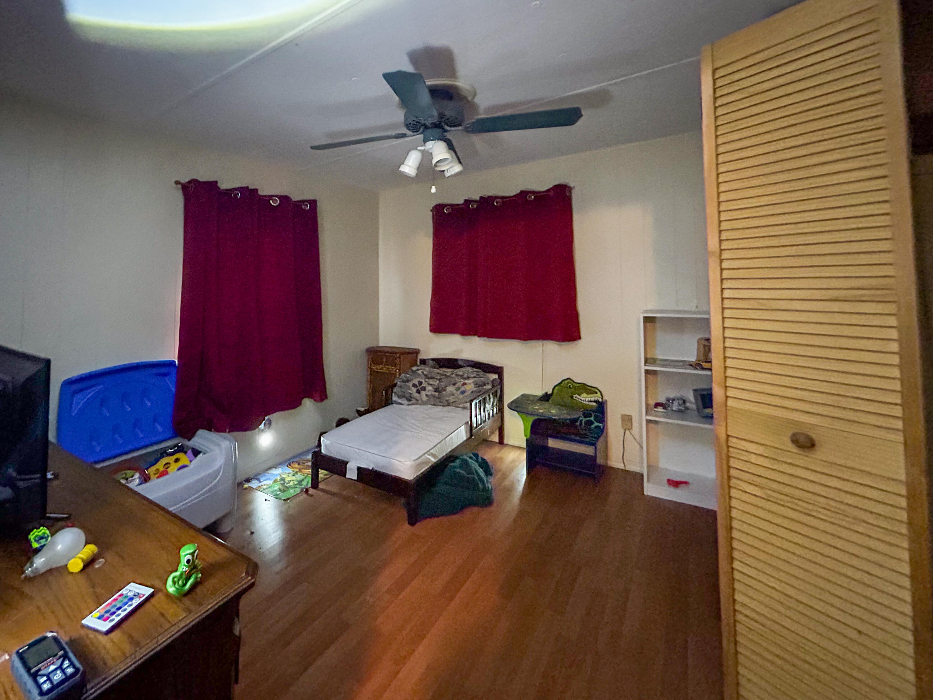 2446 Southeast Carroll Street Stuart, FL 34997 - Photo 21 of 37 a living room with furniture and a window