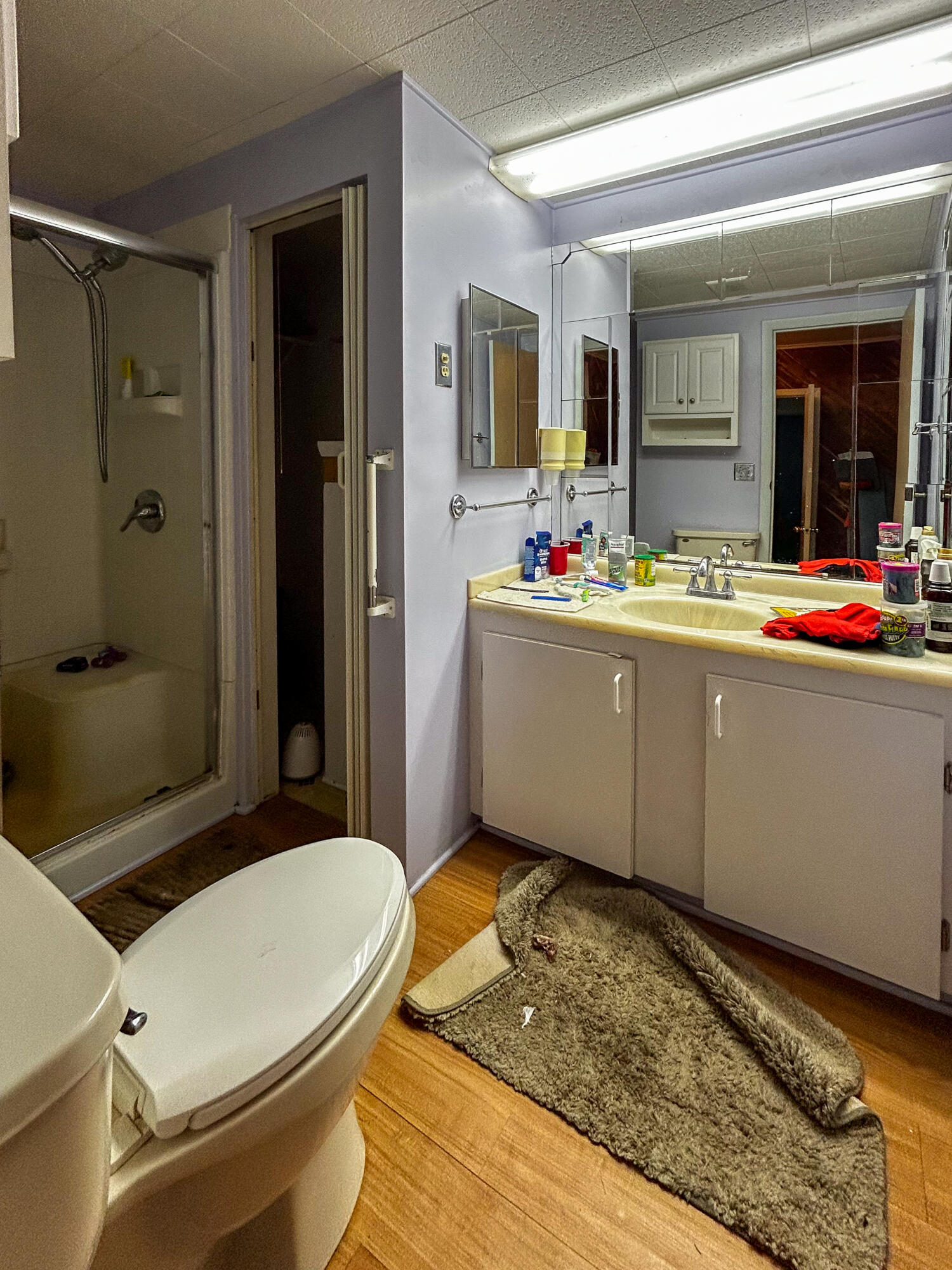 2446 Southeast Carroll Street Stuart, FL 34997 - Photo 27 of 37 a living room with a couch and a table