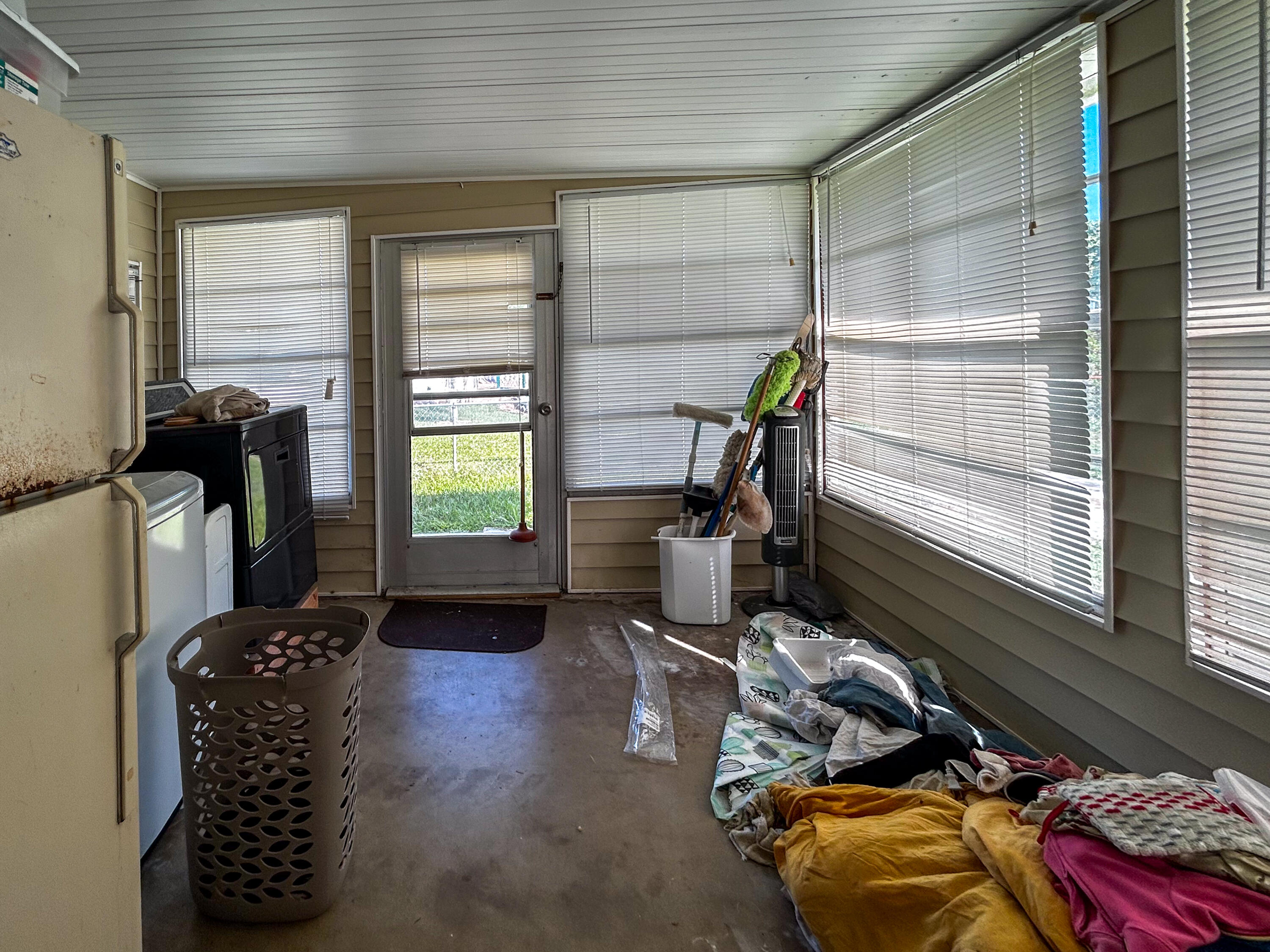 2446 Southeast Carroll Street Stuart, FL 34997 - Photo 28 of 37 a room with furniture and a window