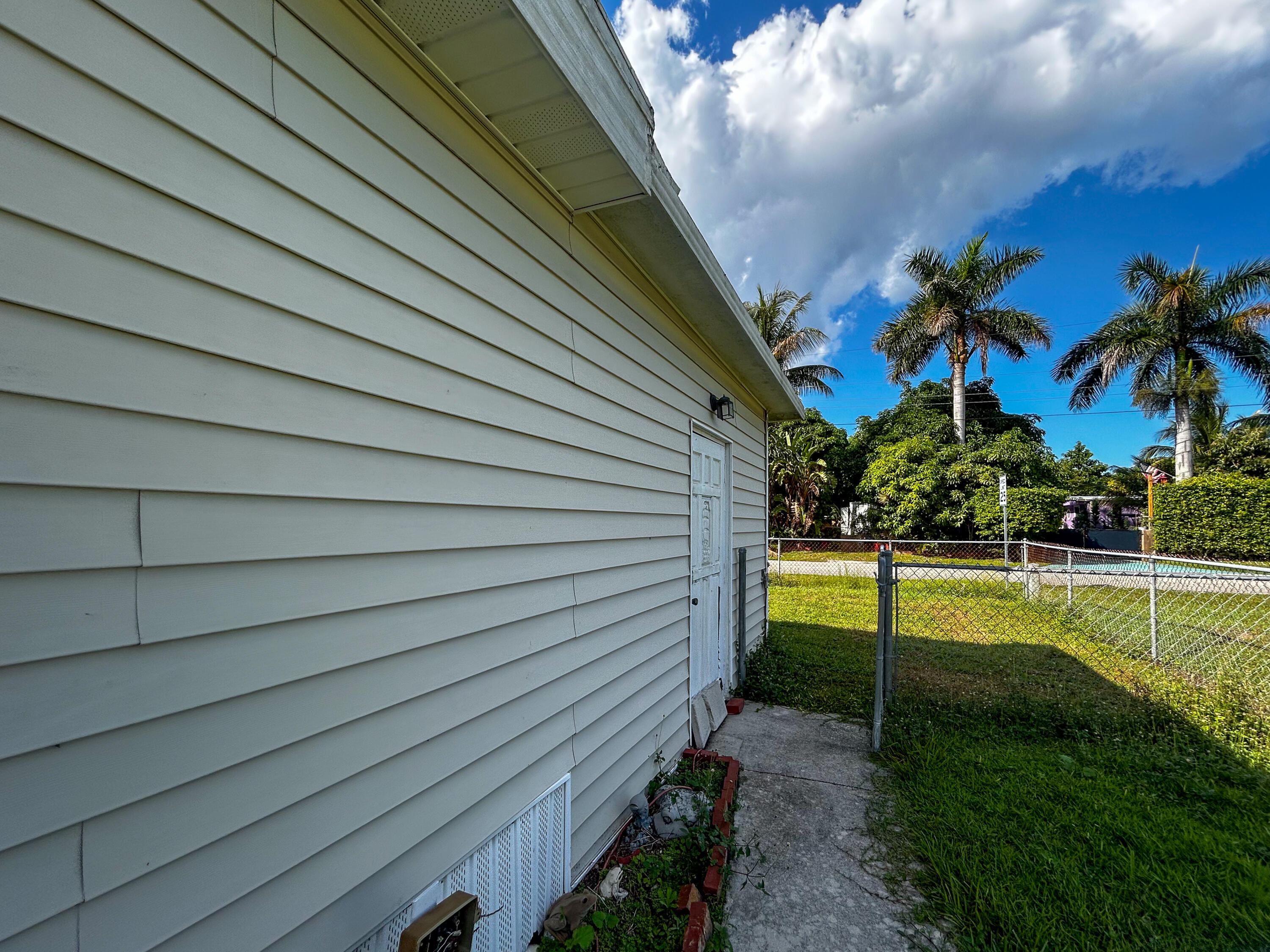2446 Southeast Carroll Street Stuart, FL 34997 - Photo 33 of 37 a view of swimming pool from a window