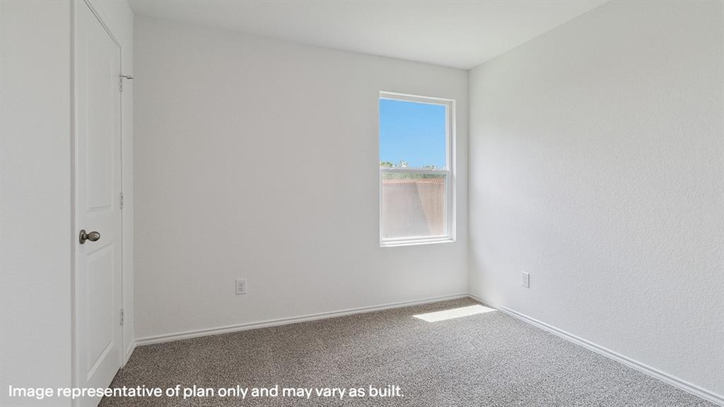 3522 Spring Time Street Forney, TX 75126 - Photo 25 of 27 Bright interior space featuring a single window and neutral carpeting