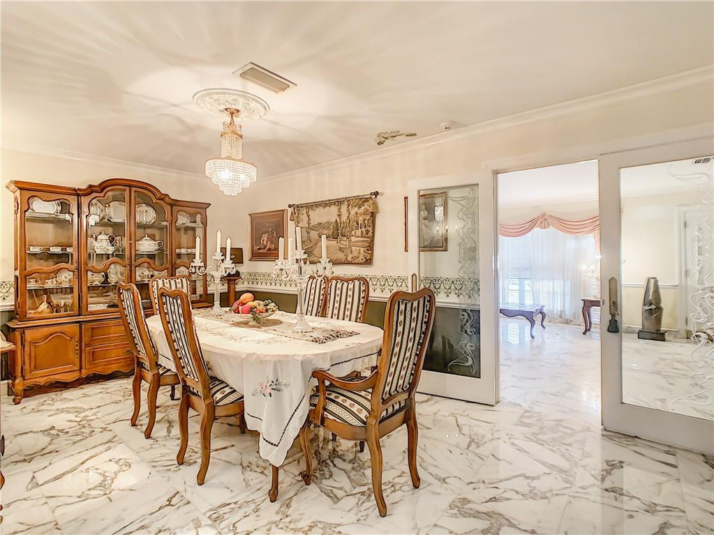 1234 Funston Street Hollywood, FL 33019 - Photo 11 of 23 a view of a dining room with furniture