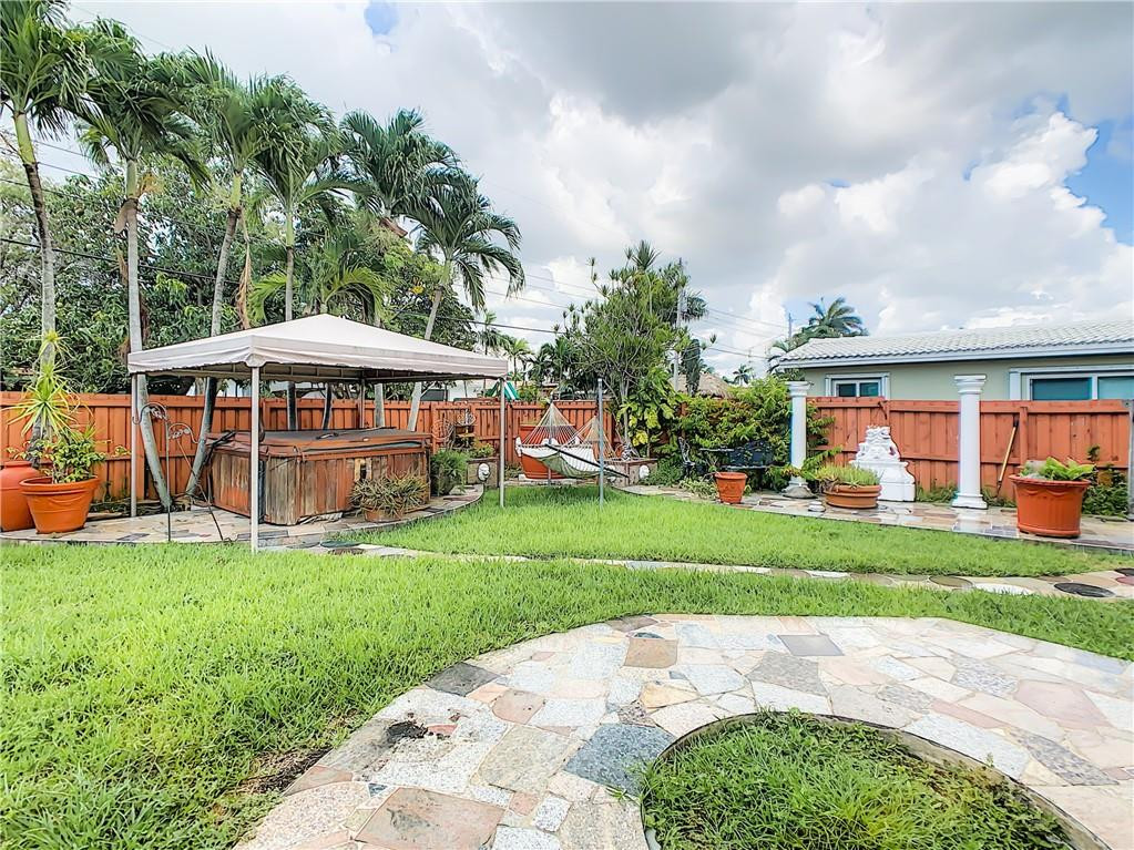 1234 Funston Street Hollywood, FL 33019 - Photo 23 of 23 a view of a house with a yard