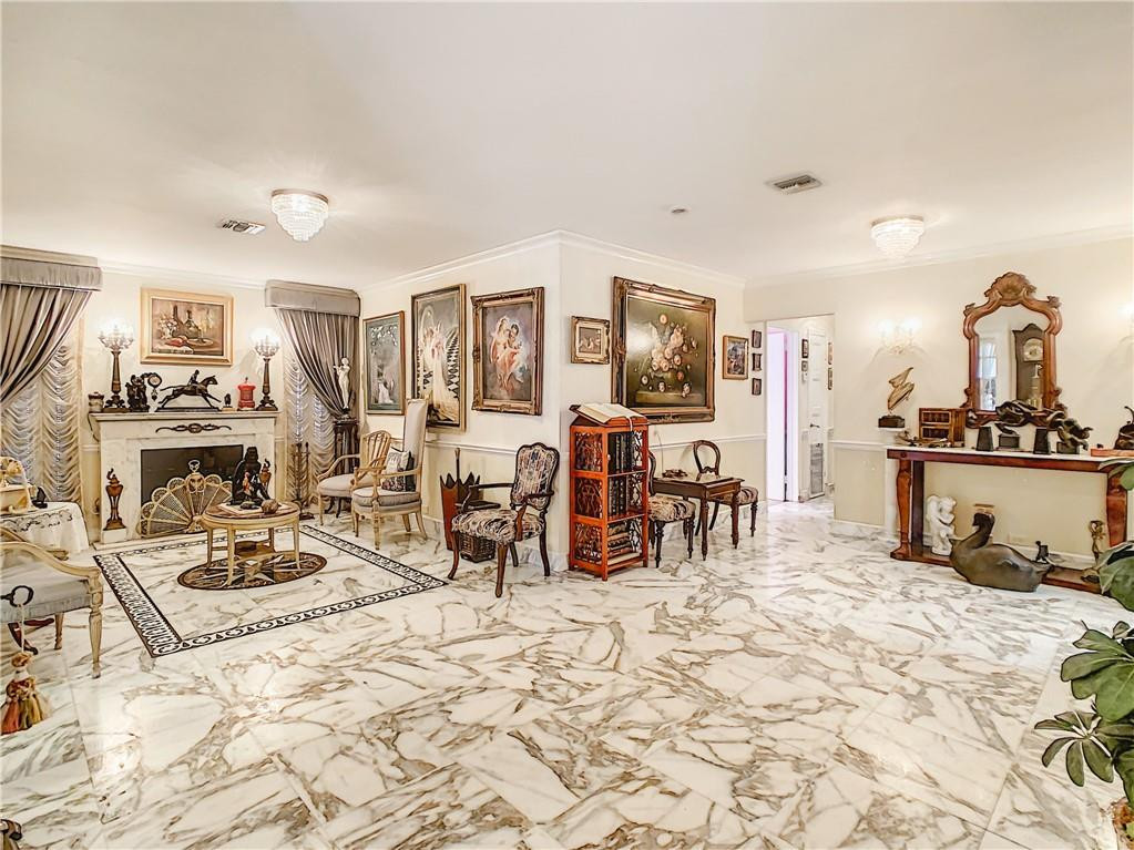 1234 Funston Street Hollywood, FL 33019 - Photo 4 of 23 a view of a livingroom with furniture and a flat screen tv
