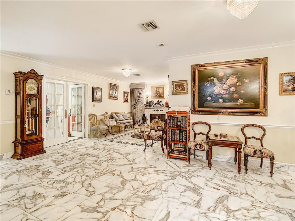 1234 Funston Street Hollywood, FL 33019 - Photo 5 of 23 a living room with furniture and a flat screen tv