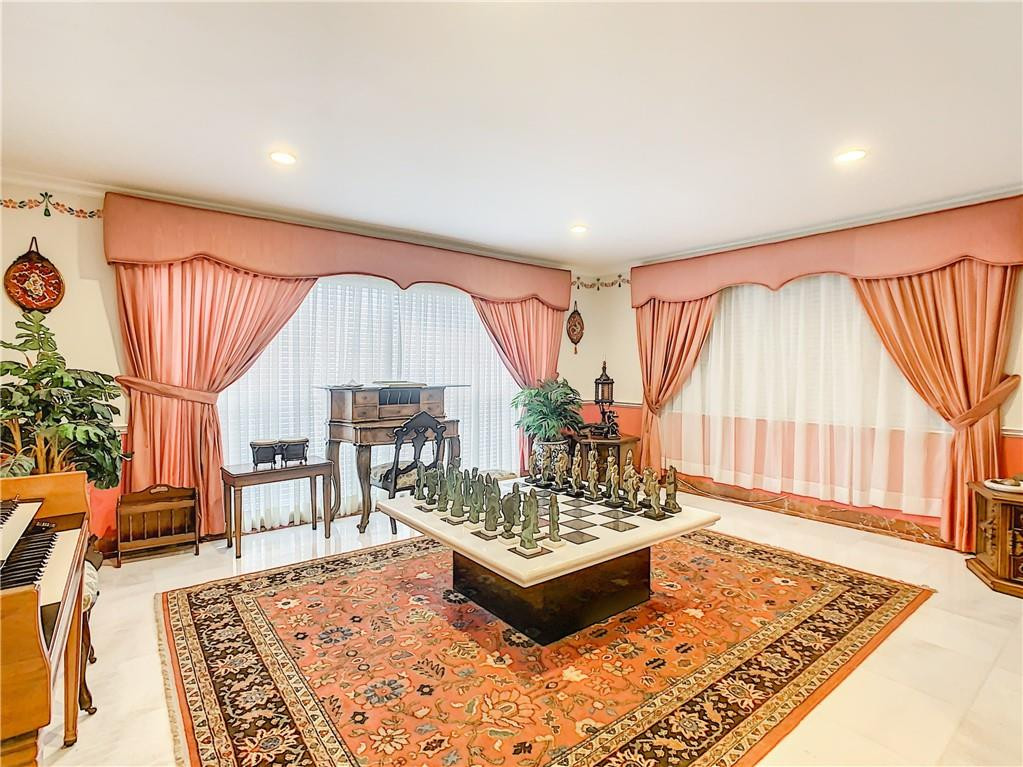 1234 Funston Street Hollywood, FL 33019 - Photo 6 of 23 a living room with a couch and a table