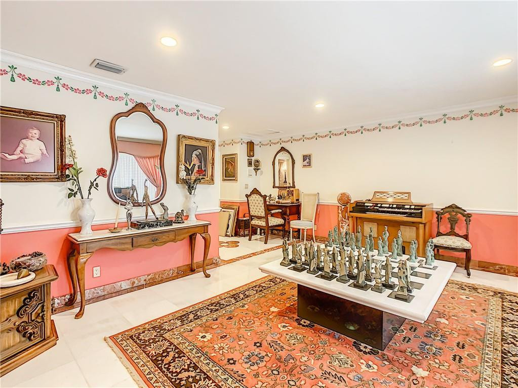 1234 Funston Street Hollywood, FL 33019 - Photo 7 of 23 a living room with lots of furniture and a rug
