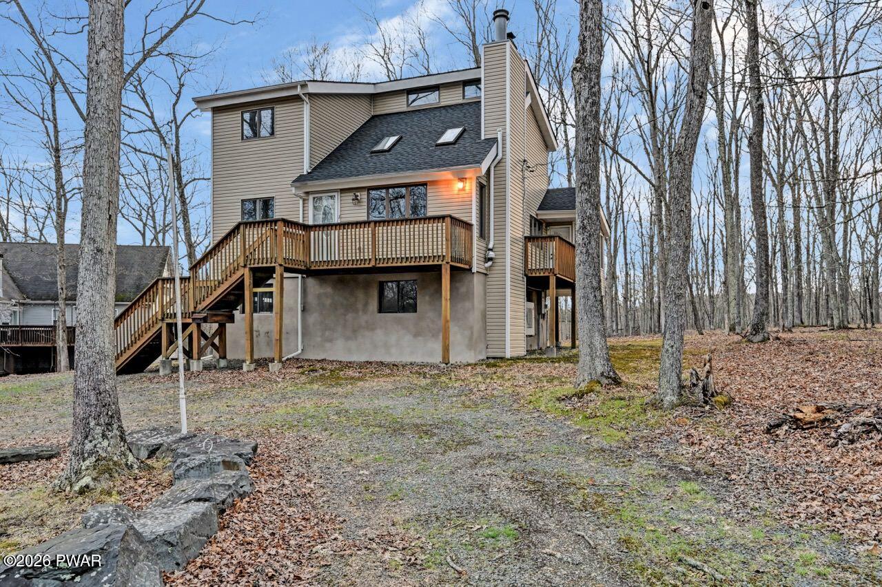 258 Lakeview Road Lackawaxen, PA 18435 - Photo 119 of 119 a house that has a tree in front of it