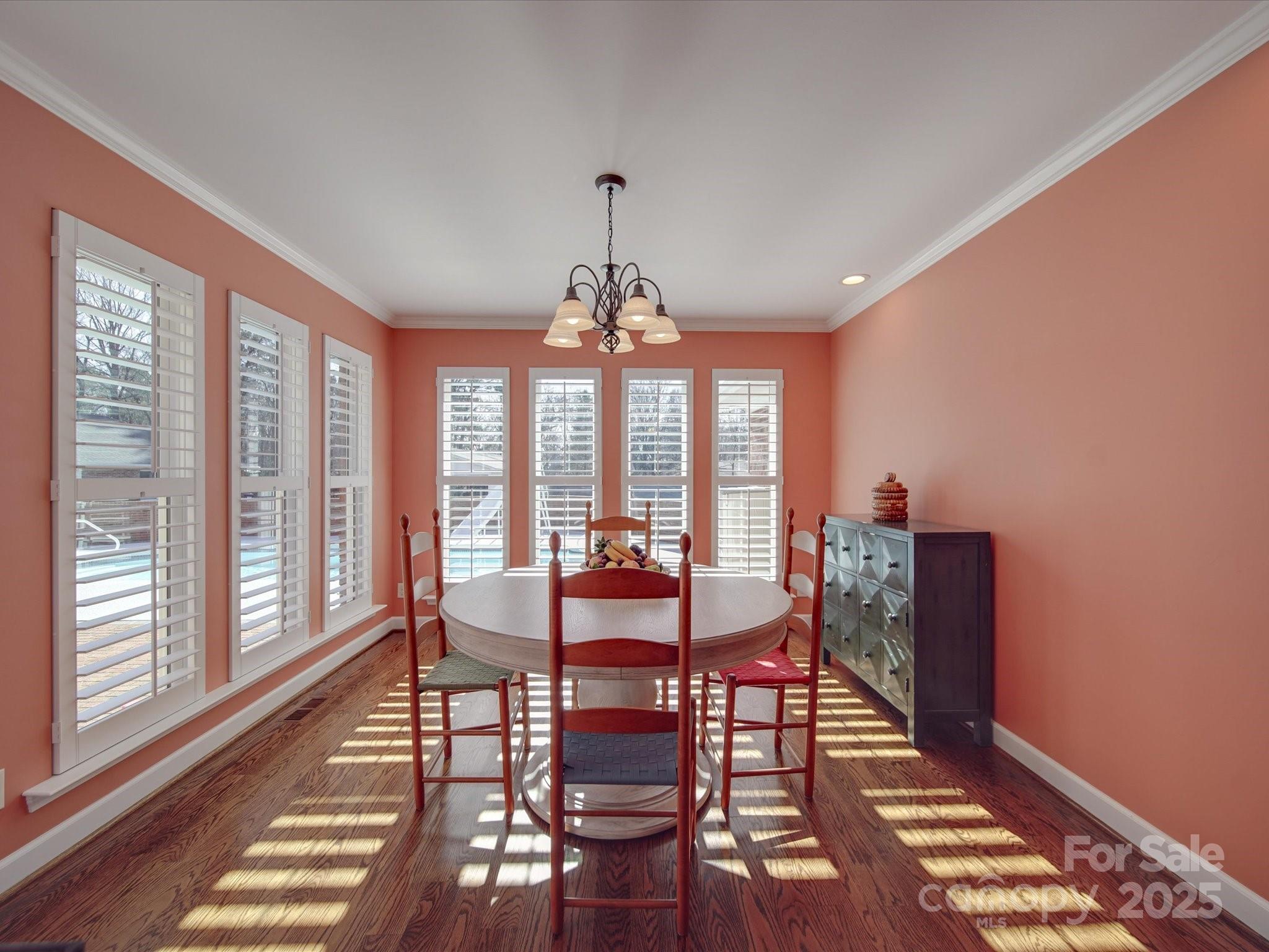 7169 Pleasant Grove Road Charlotte, NC 28216 - Photo 26 of 48 a view of a dining room with furniture window and outside view