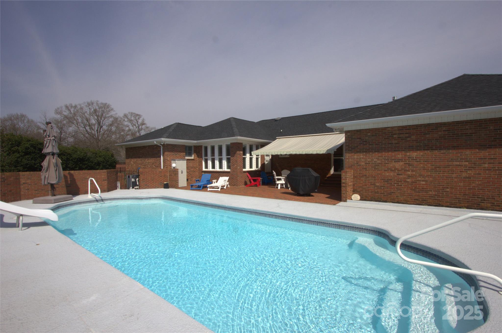 7169 Pleasant Grove Road Charlotte, NC 28216 - Photo 45 of 48 a view of a house with pool