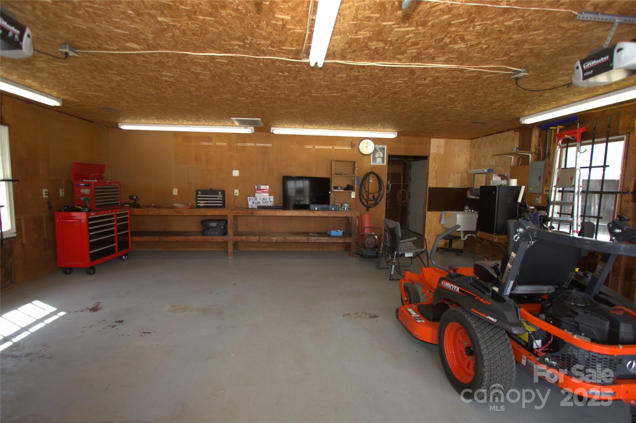 7169 Pleasant Grove Road Charlotte, NC 28216 - Photo 48 of 48 a view of a room with gym equipment