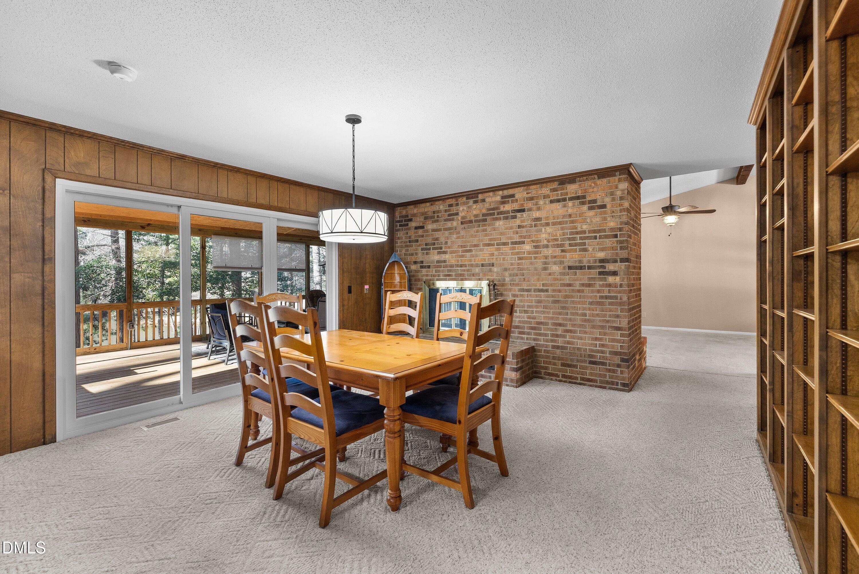 3113 Chipping Wedge Sanford, NC 27332 - Photo 8 of 42 a view of a dining room with furniture window and outside view