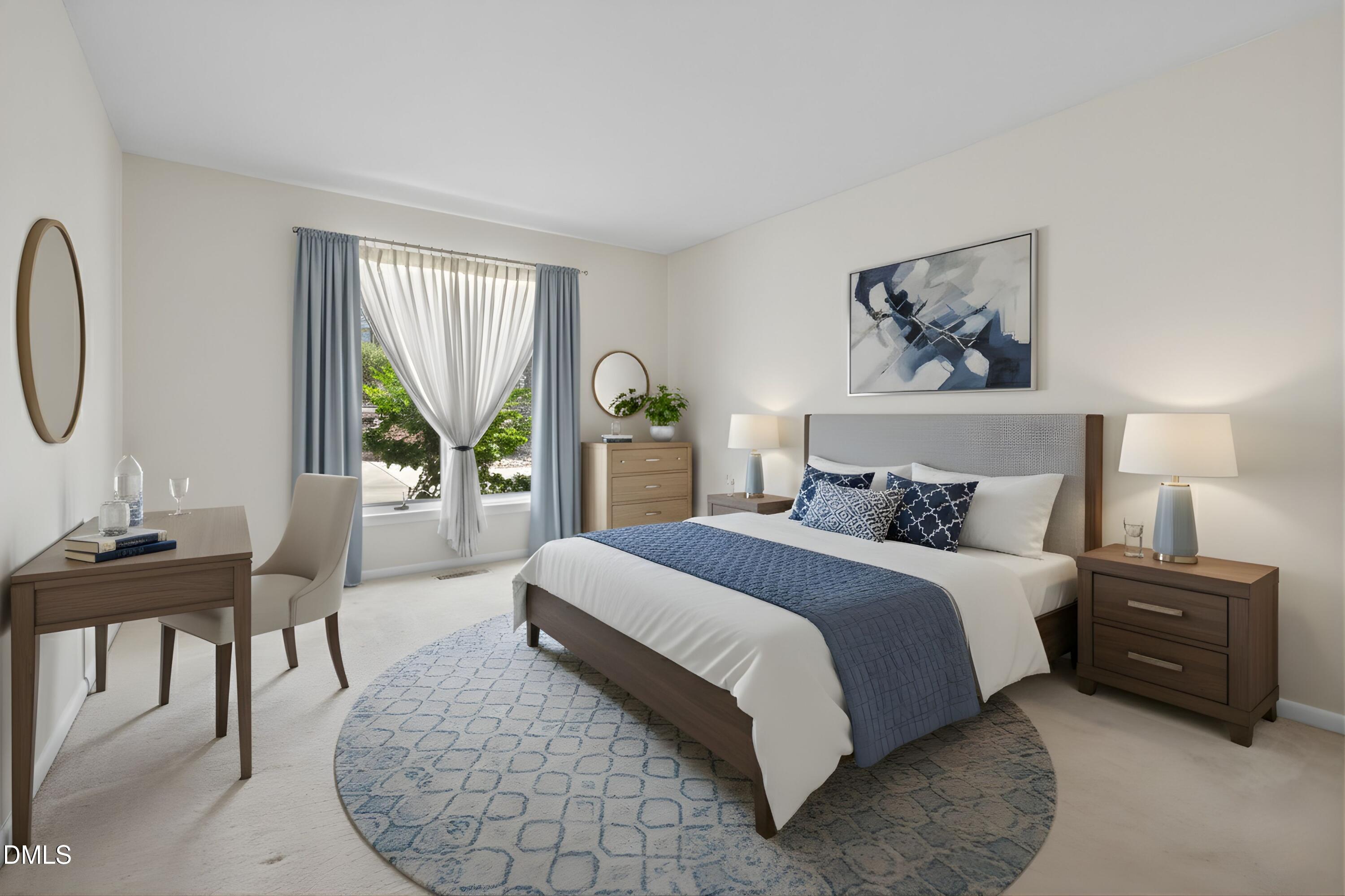 3113 Chipping Wedge Sanford, NC 27332 - Photo 13 of 42 a spacious bedroom with a bed a table and a large window