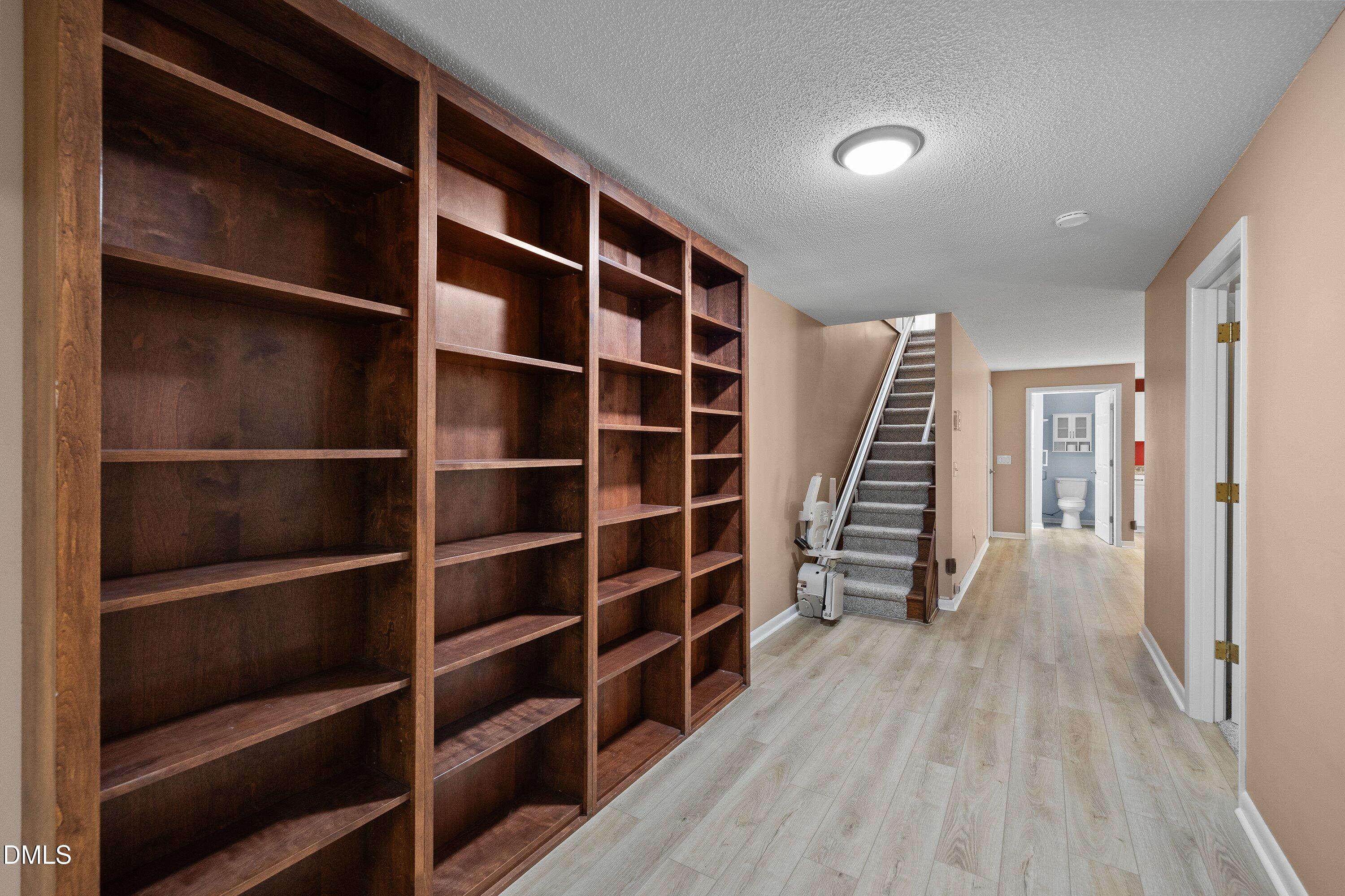 3113 Chipping Wedge Sanford, NC 27332 - Photo 16 of 42 a view of walk in closet with empty racks