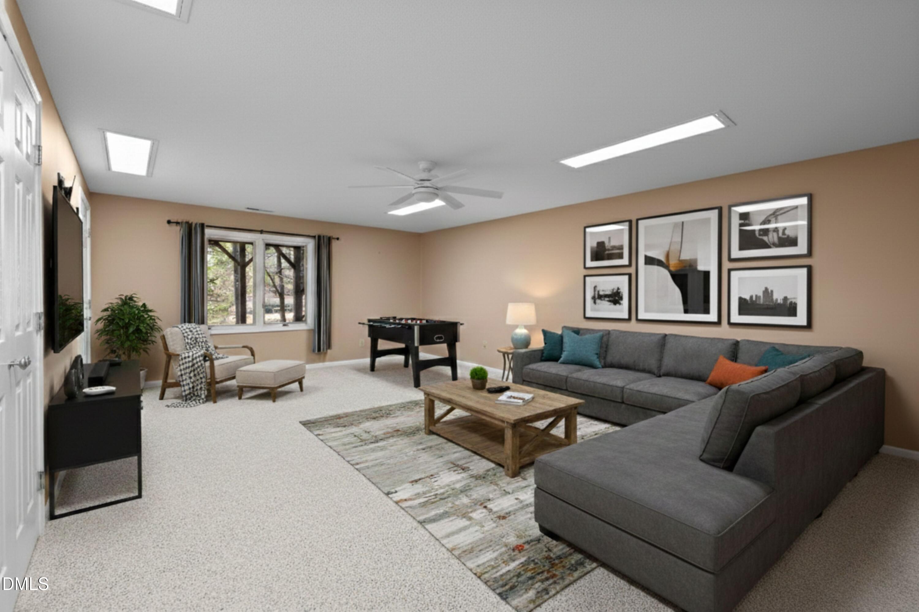 3113 Chipping Wedge Sanford, NC 27332 - Photo 19 of 42 a living room with furniture and a window