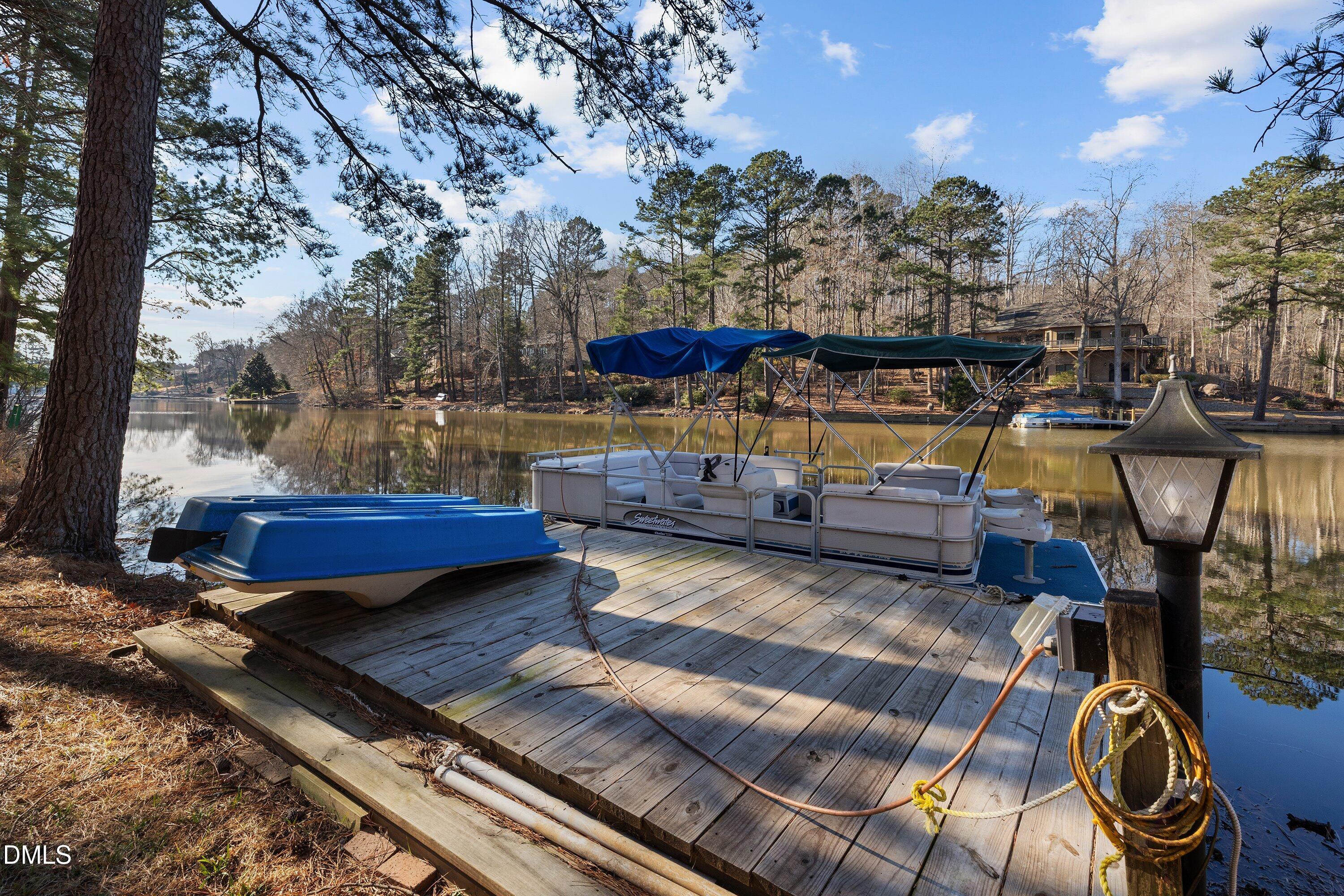 3113 Chipping Wedge Sanford, NC 27332 - Photo 27 of 42 a view of a backyard with sitting area