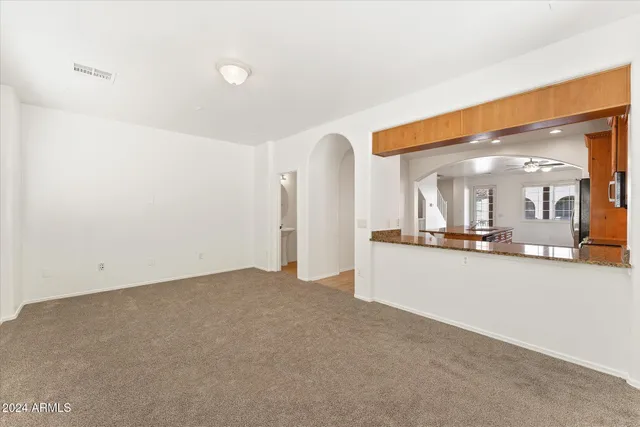 a view of a big room with a large window