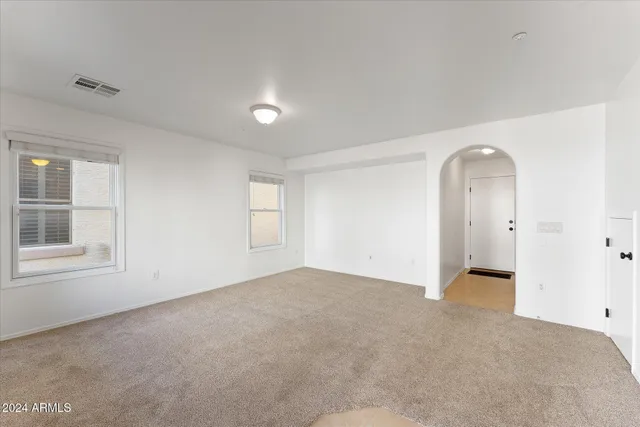 an empty room with windows