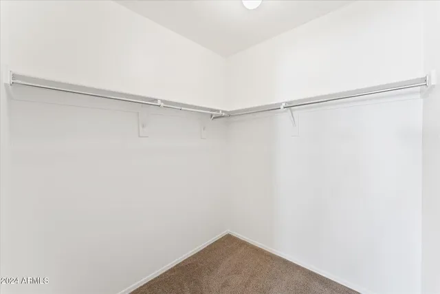 a view of a room with shelf on the wall