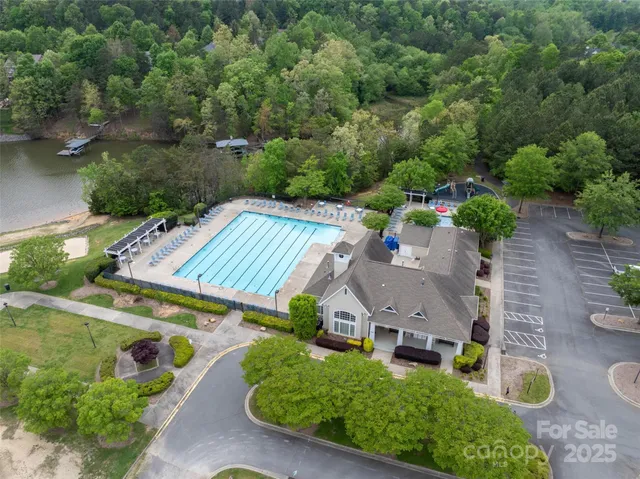 an aerial view of a house with a garden