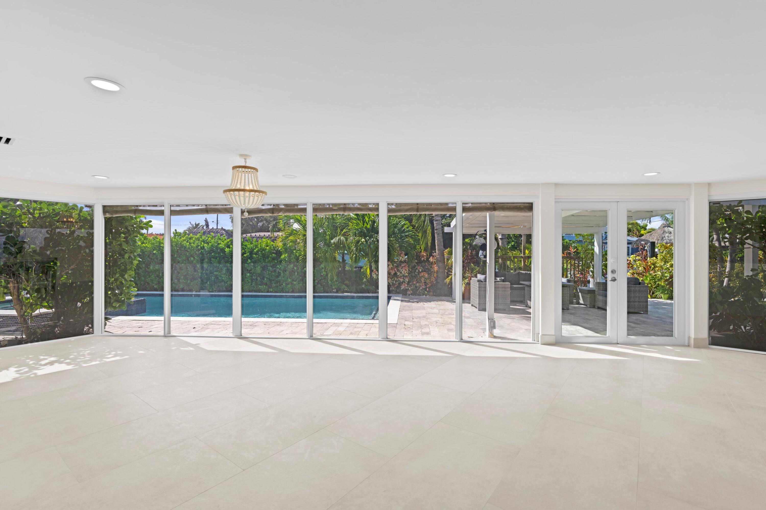 391 Southeast 7th Avenue Pompano Beach, FL 33060 - Photo 16 of 38 a view of an empty room with a balcony