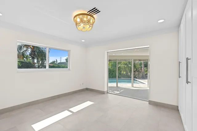 a white bath tub sitting next to a white sink