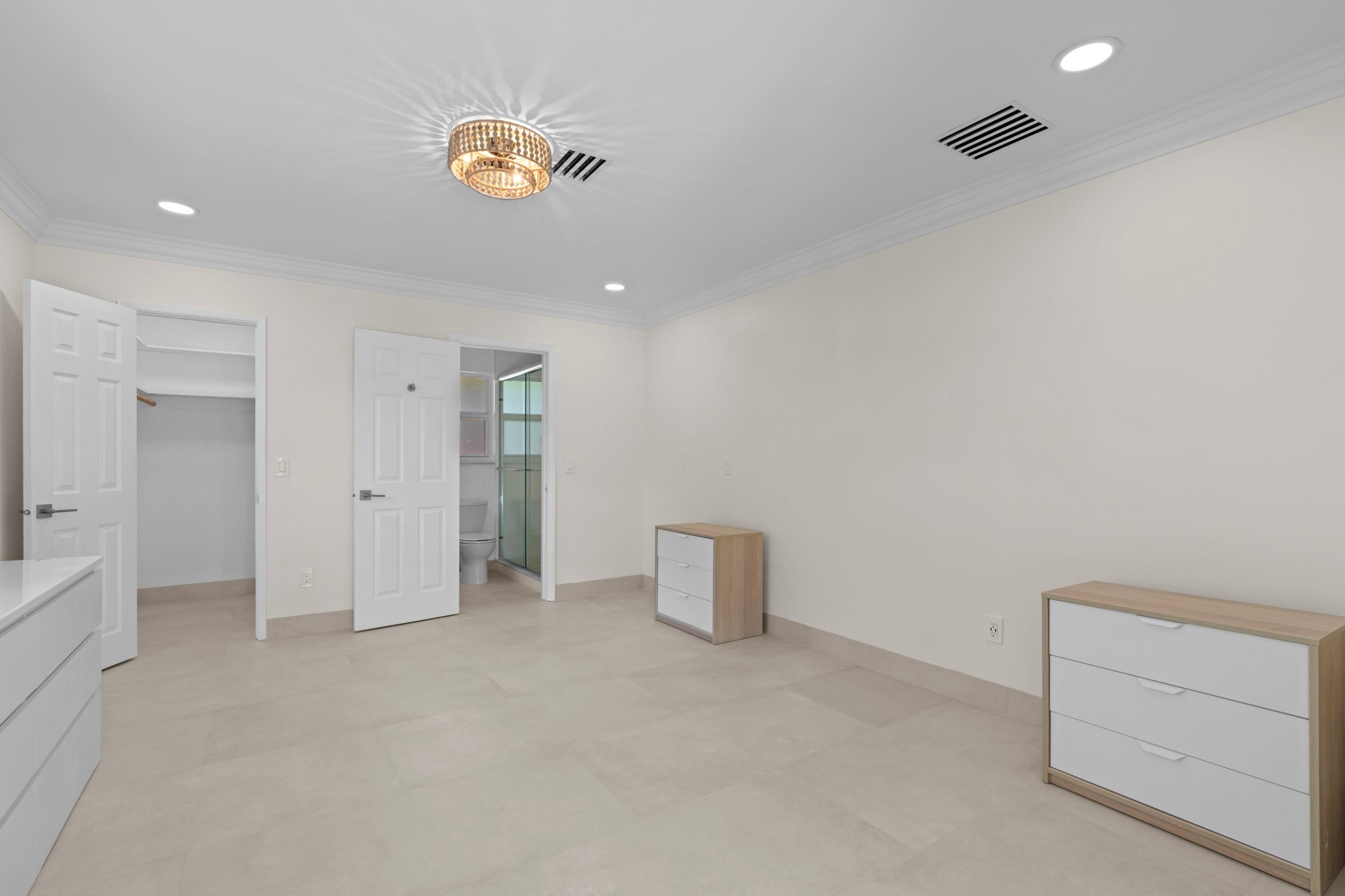 391 Southeast 7th Avenue Pompano Beach, FL 33060 - Photo 28 of 38 a view of an empty room