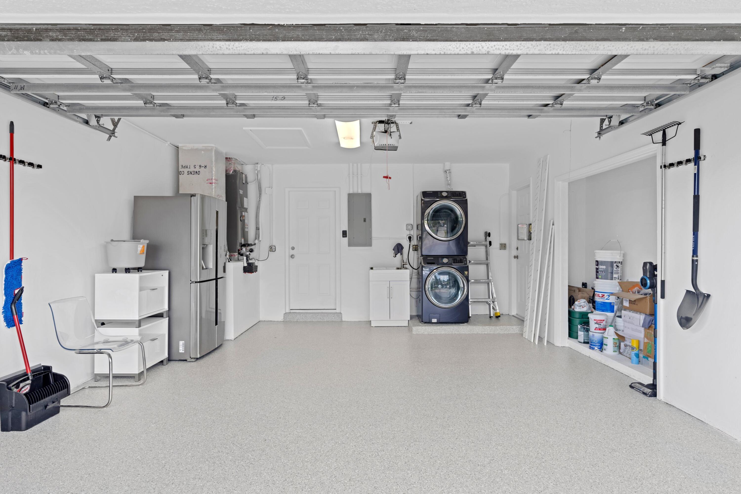 391 Southeast 7th Avenue Pompano Beach, FL 33060 - Photo 36 of 38 a view of a storage & utility room with two washing machine