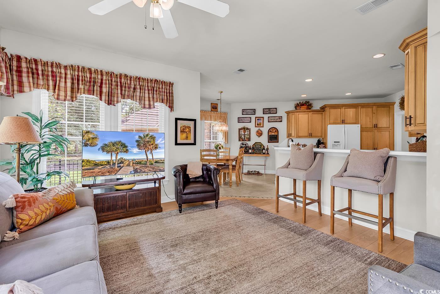 4507 Smilax Place Murrells Inlet, SC 29576 - Photo 12 of 39 Living room with ceiling fan, light wood finished floors, and recessed lighting