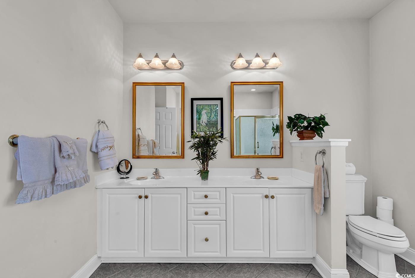 4507 Smilax Place Murrells Inlet, SC 29576 - Photo 22 of 39 Full bath featuring double vanity and a shower with shower door