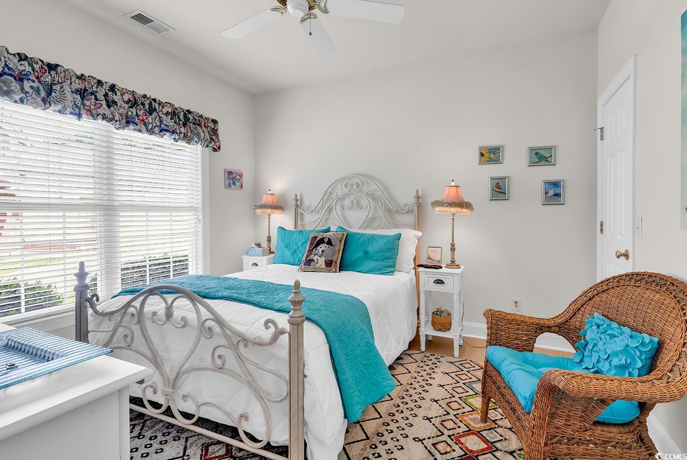 4507 Smilax Place Murrells Inlet, SC 29576 - Photo 24 of 39 Bedroom featuring multiple windows and ceiling fan