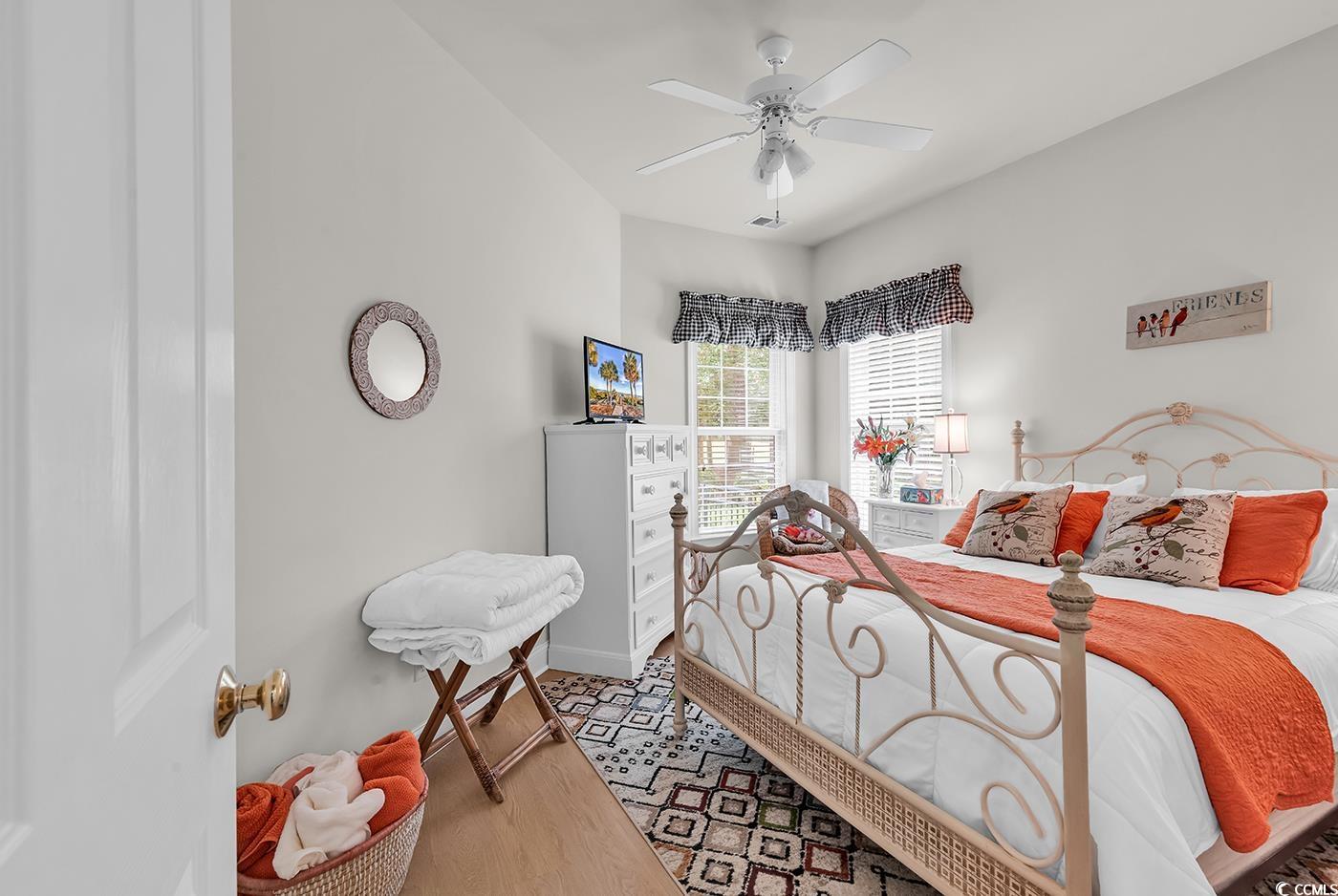 4507 Smilax Place Murrells Inlet, SC 29576 - Photo 26 of 39 Bedroom featuring wood finished floors and ceiling fan