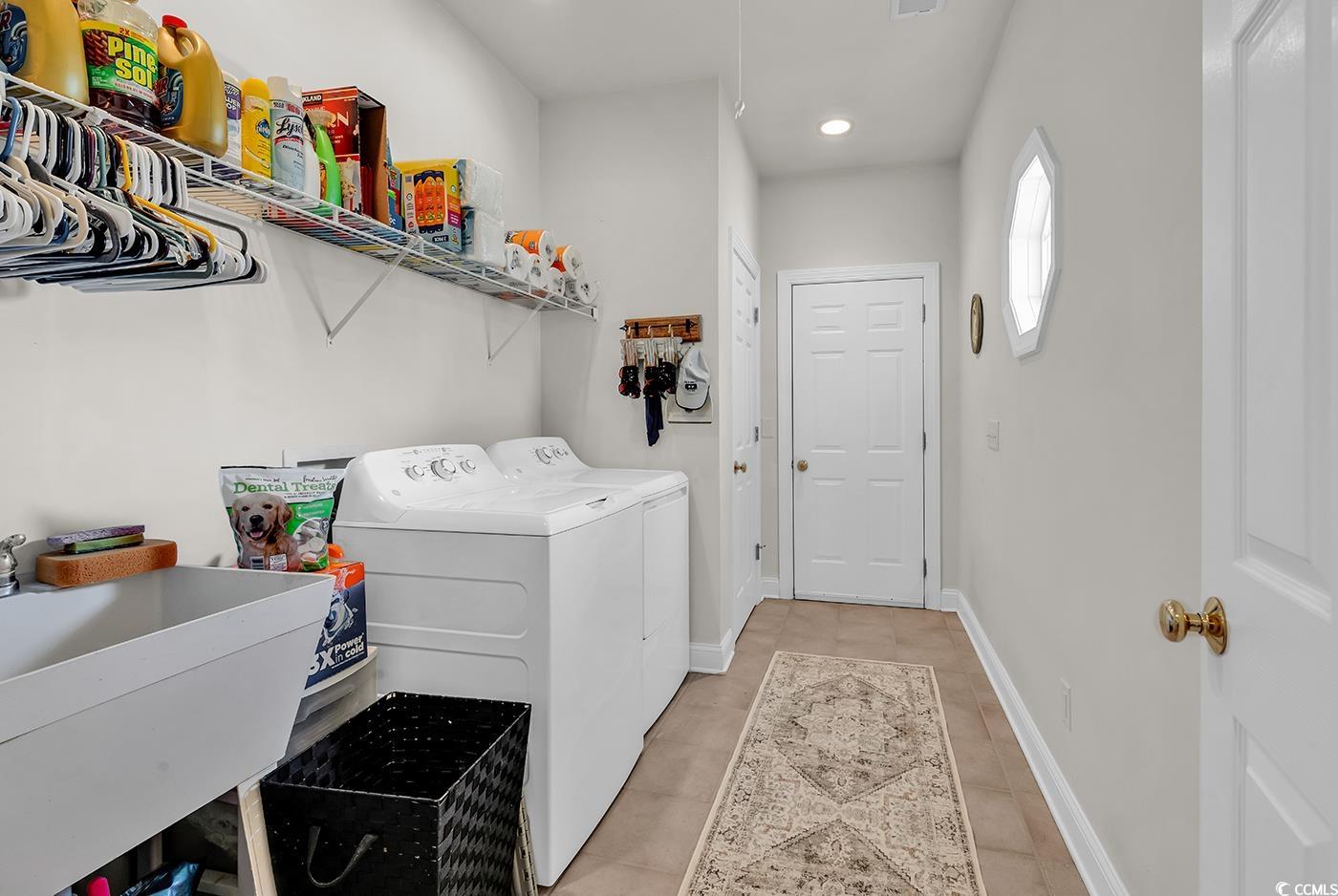 4507 Smilax Place Murrells Inlet, SC 29576 - Photo 28 of 39 Laundry area featuring independent washer and dryer, light tile patterned flooring, and recessed lighting