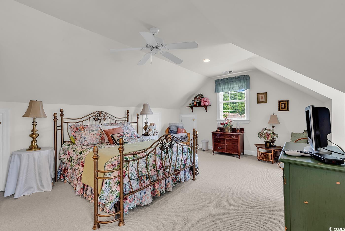 4507 Smilax Place Murrells Inlet, SC 29576 - Photo 30 of 39 Carpeted bedroom with lofted ceiling, a ceiling fan, and recessed lighting