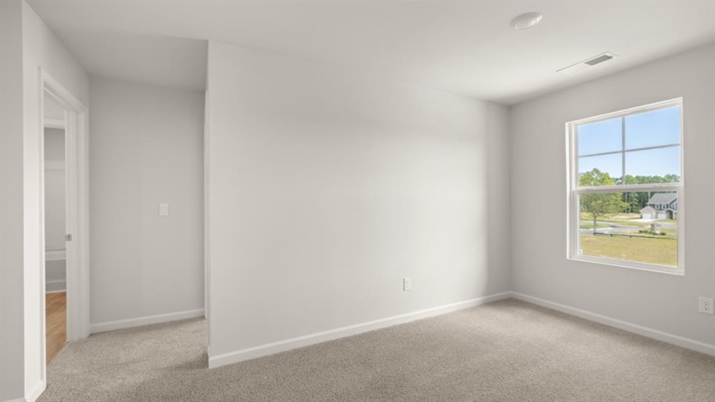 904 Sundown Point Villa Rica, GA 30180 - Photo 28 of 83 an empty room with windows