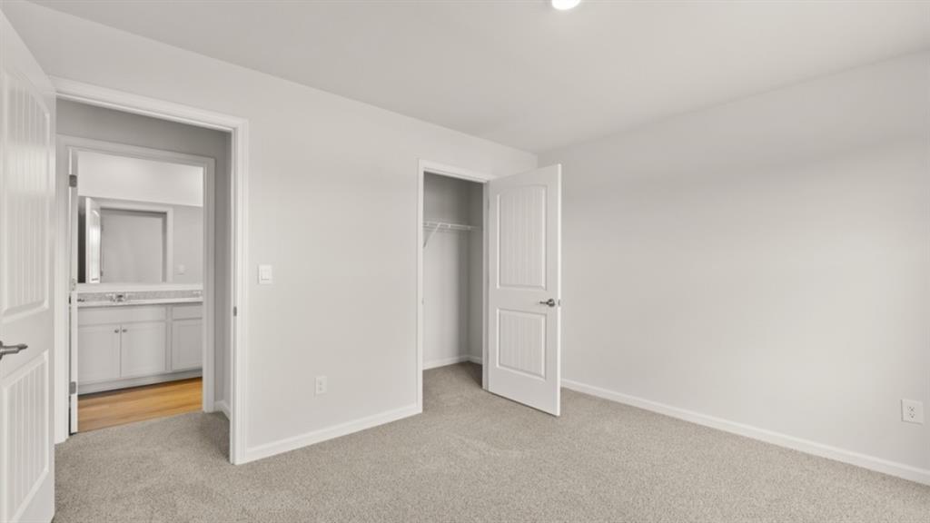 904 Sundown Point Villa Rica, GA 30180 - Photo 43 of 83 a view of an empty room and closet